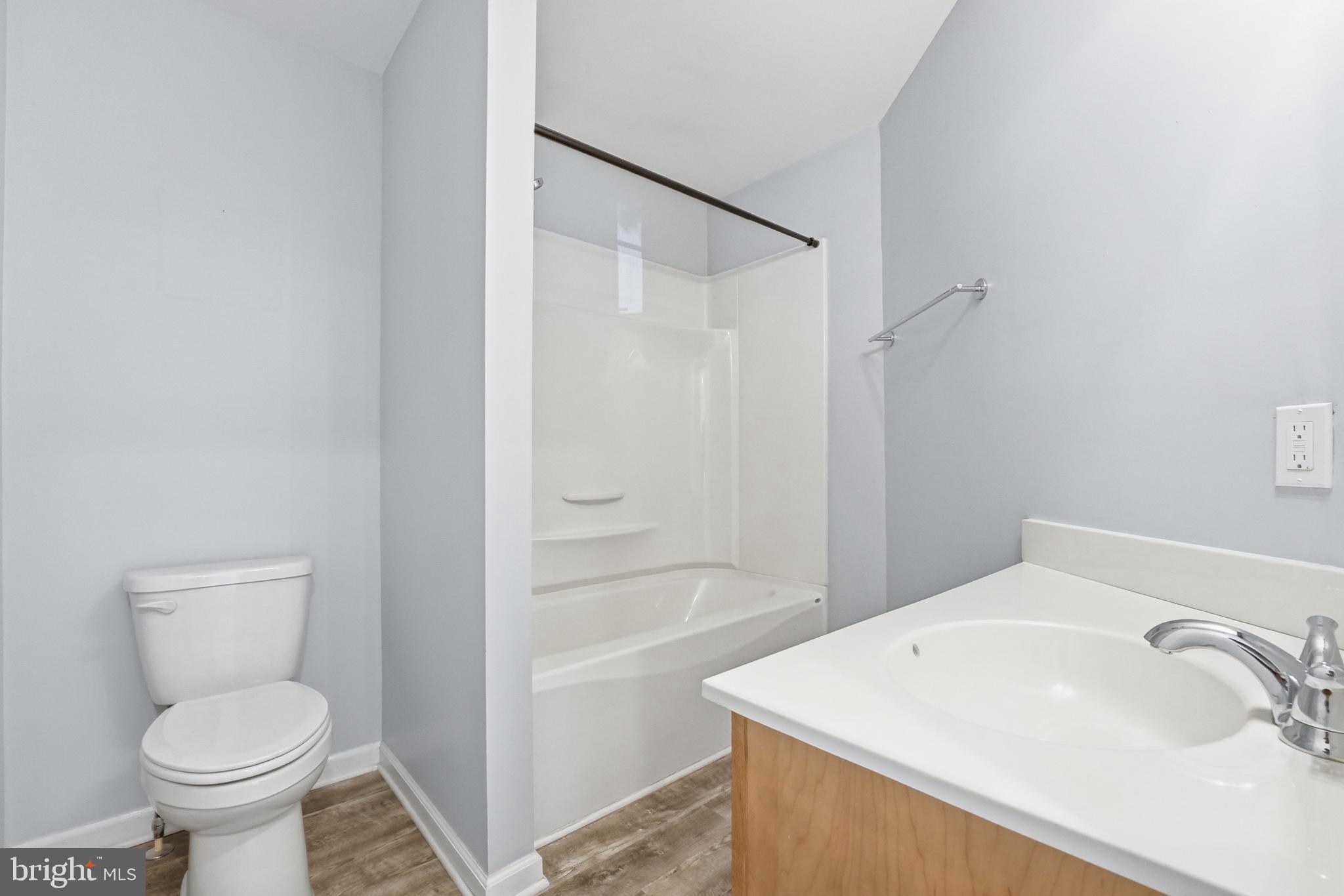 6537 Watery Mountain Road Warrenton, VA 20186 - Photo 28 of 44 a bathroom with a sink a toilet and shower