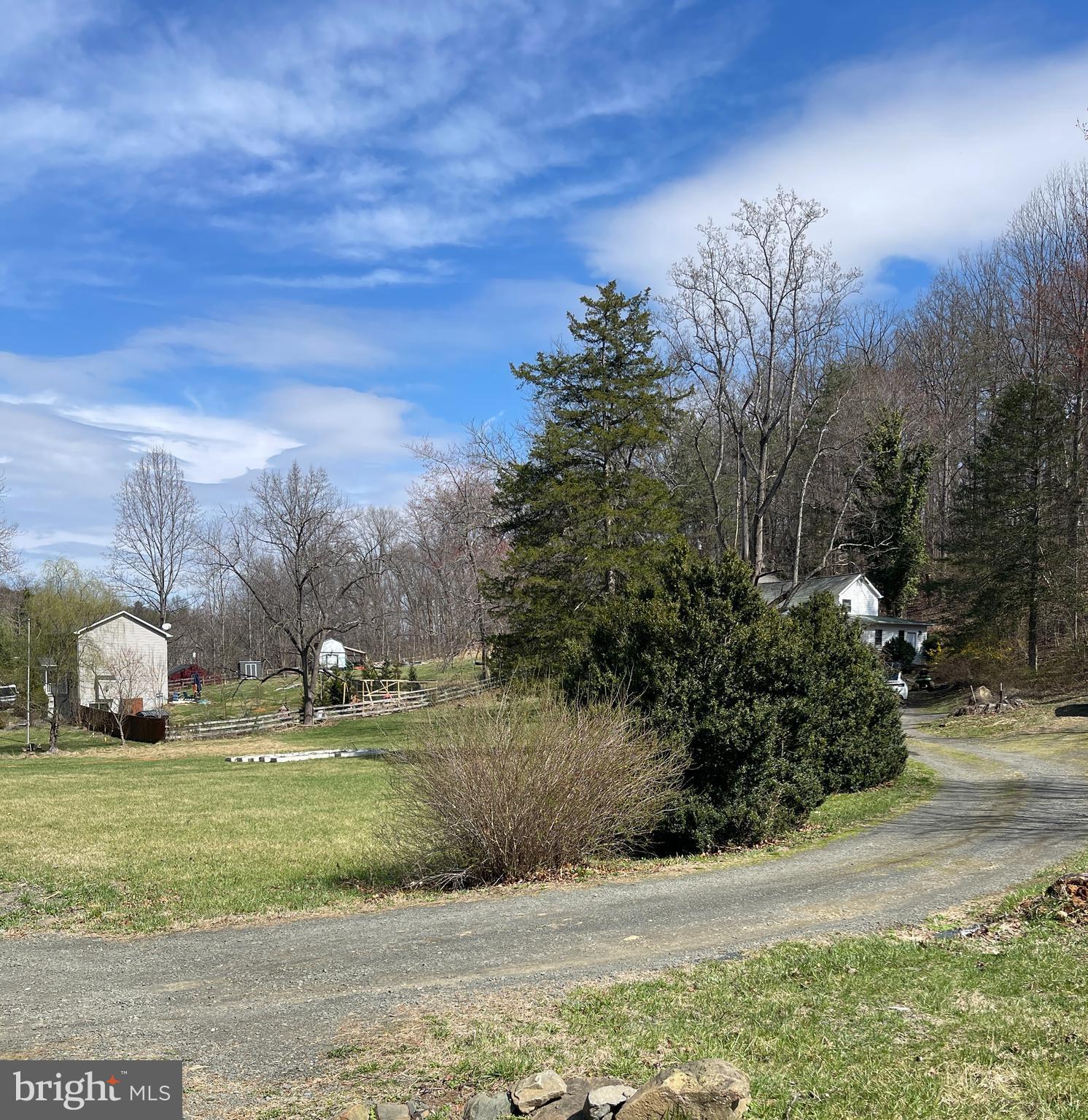 6537 Watery Mountain Road Warrenton, VA 20186 - Photo 41 of 44 a view of a fountain in front of the house
