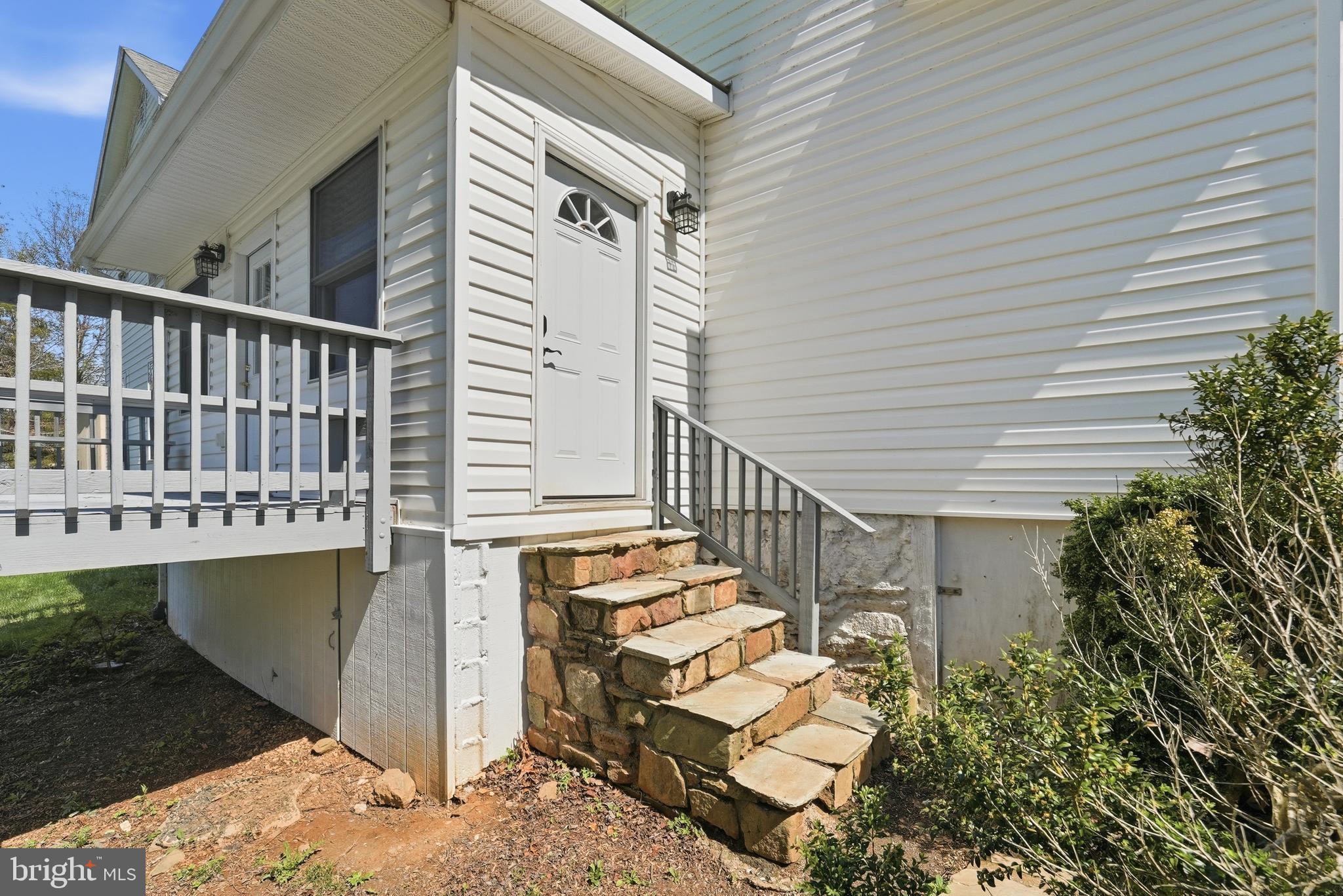 6537 Watery Mountain Road Warrenton, VA 20186 - Photo 9 of 44 a view of a house with wooden deck