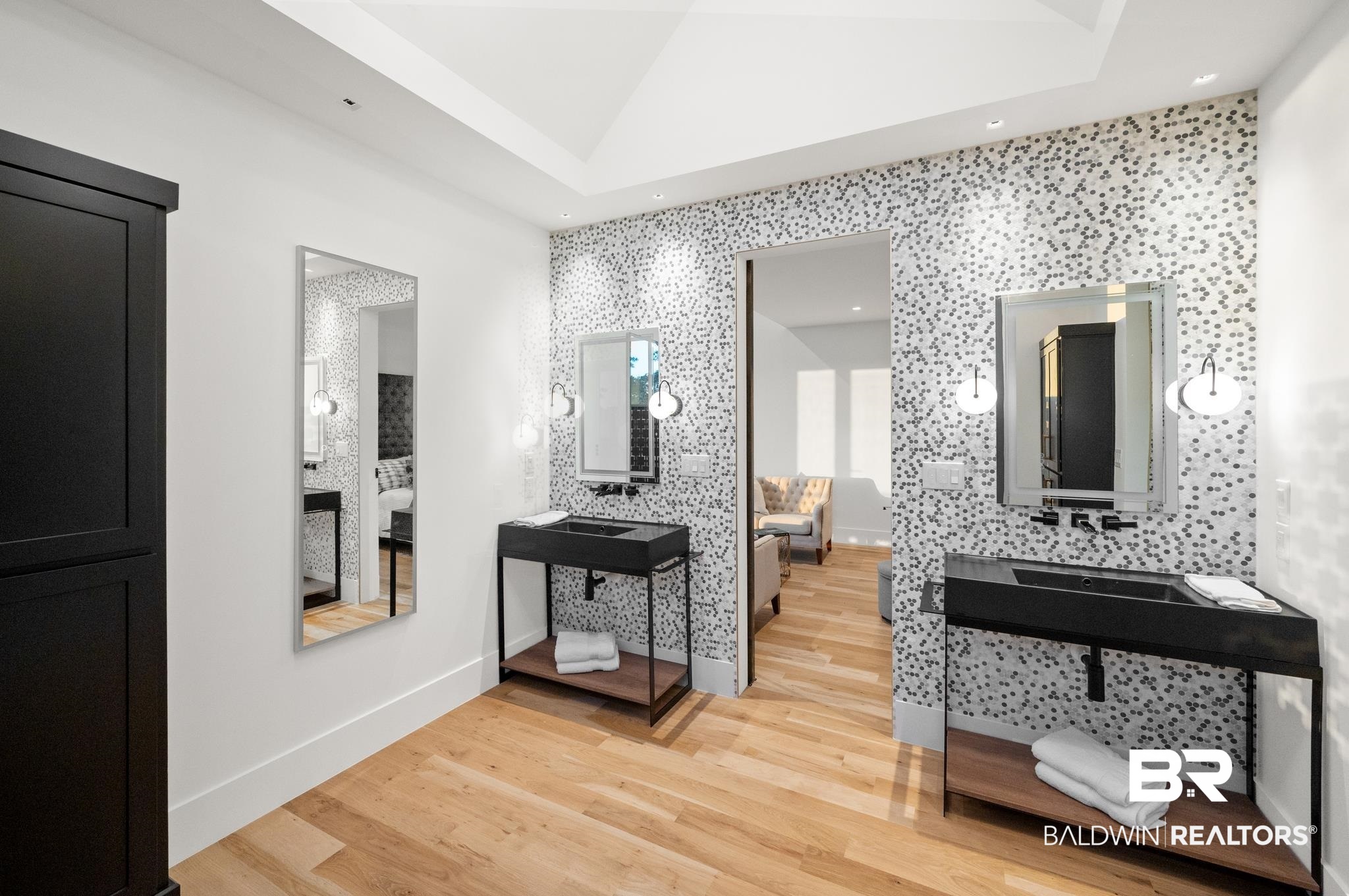 33349 River Road Orange Beach, AL 36561 - Photo 17 of 61 Dual vanity bathroom featuring light wood-finish flooring, a vaulted ceiling, and recessed lighting