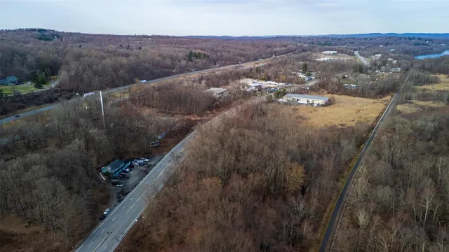 a view of balcony and yard