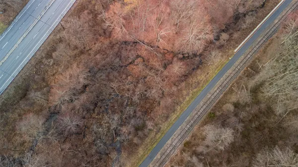 a view of balcony with wooden floor