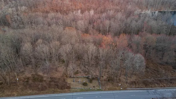 a view of balcony and yard