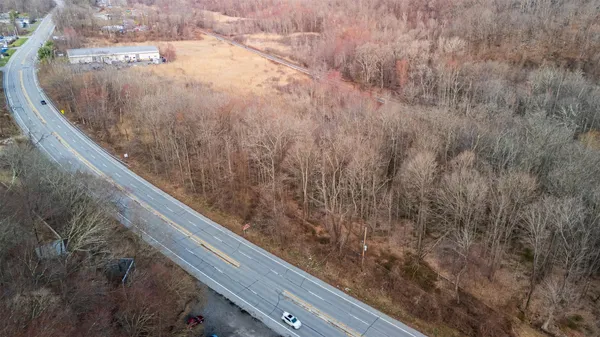 a view of balcony and yard