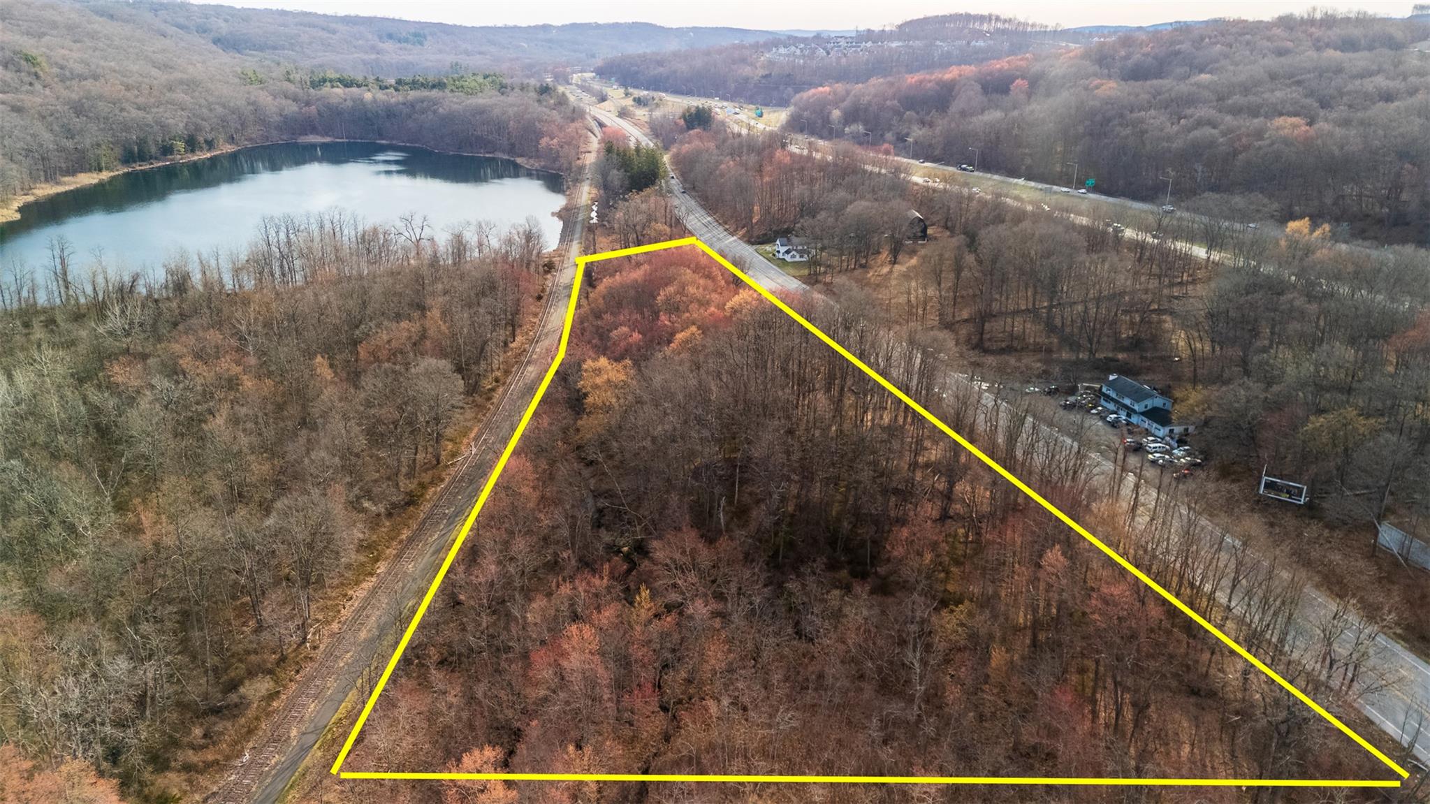 3918 Danbury Road Brewster, NY 10509 - Photo 10 of 26 Drone / aerial view featuring a water view and a view of trees