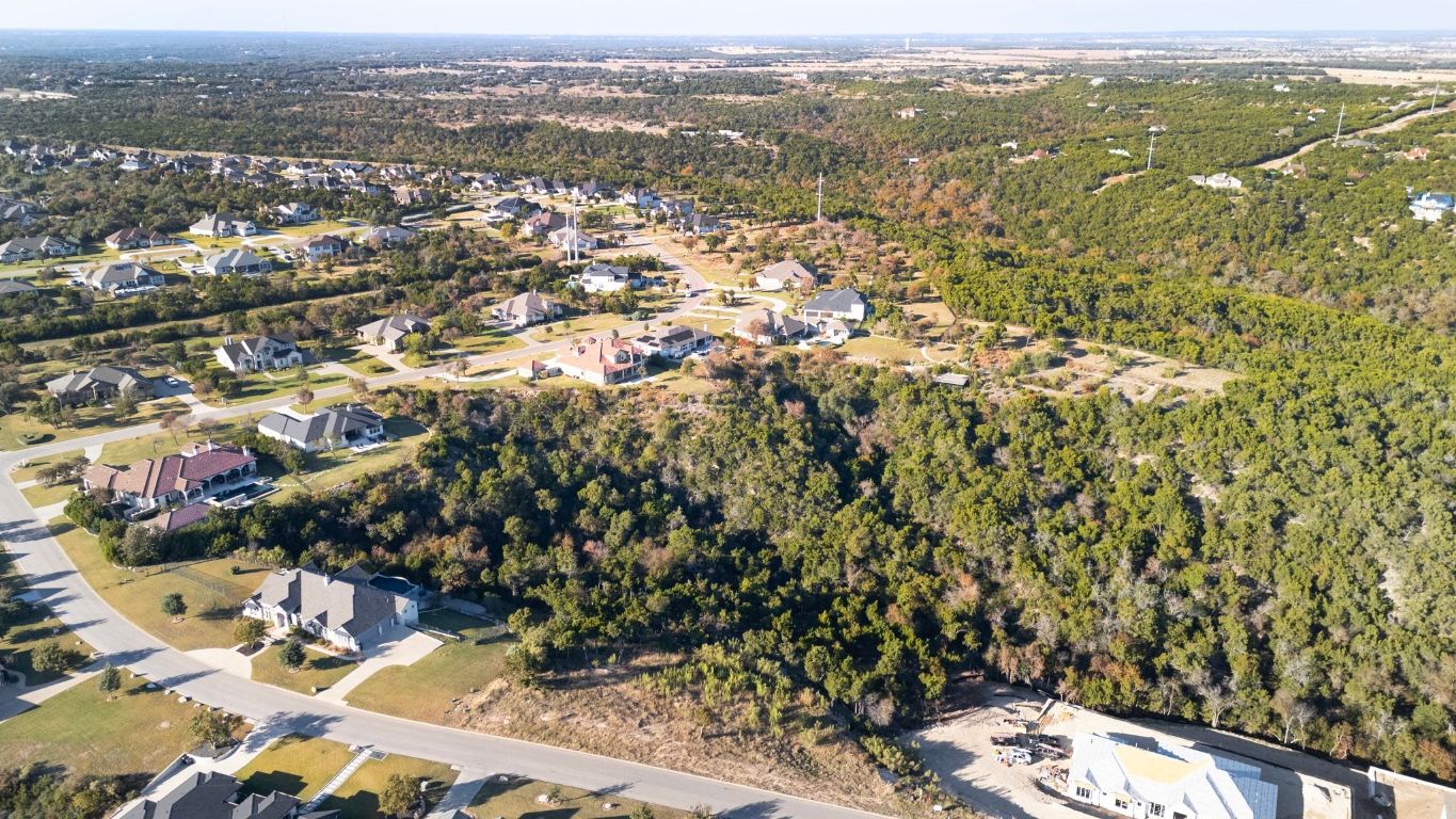 3605 Easy Money Leander, TX 78641 - Photo 3 of 9 an aerial view of residential houses with city view