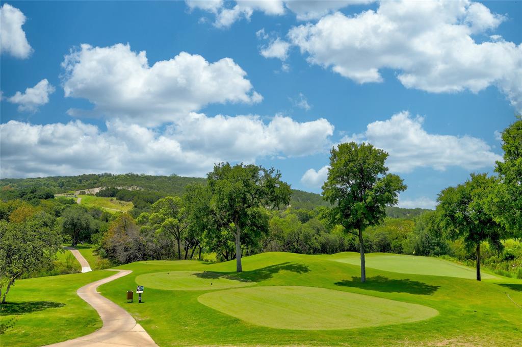3605 Easy Money Leander, TX 78641 - Photo 7 of 9 a view of a golf course with a fountain