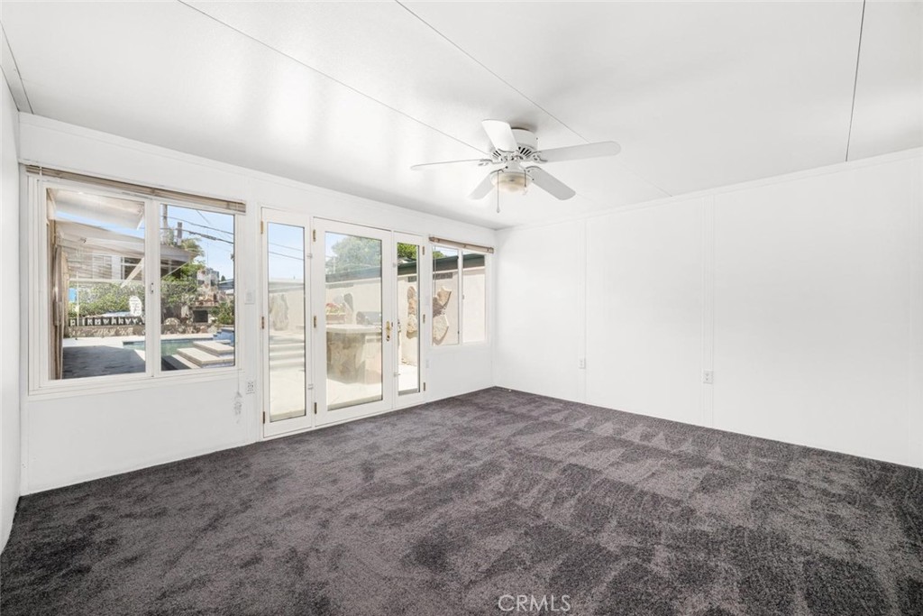 1238 North Studebaker Road Long Beach, CA 90815 - Photo 20 of 47 an empty room with windows