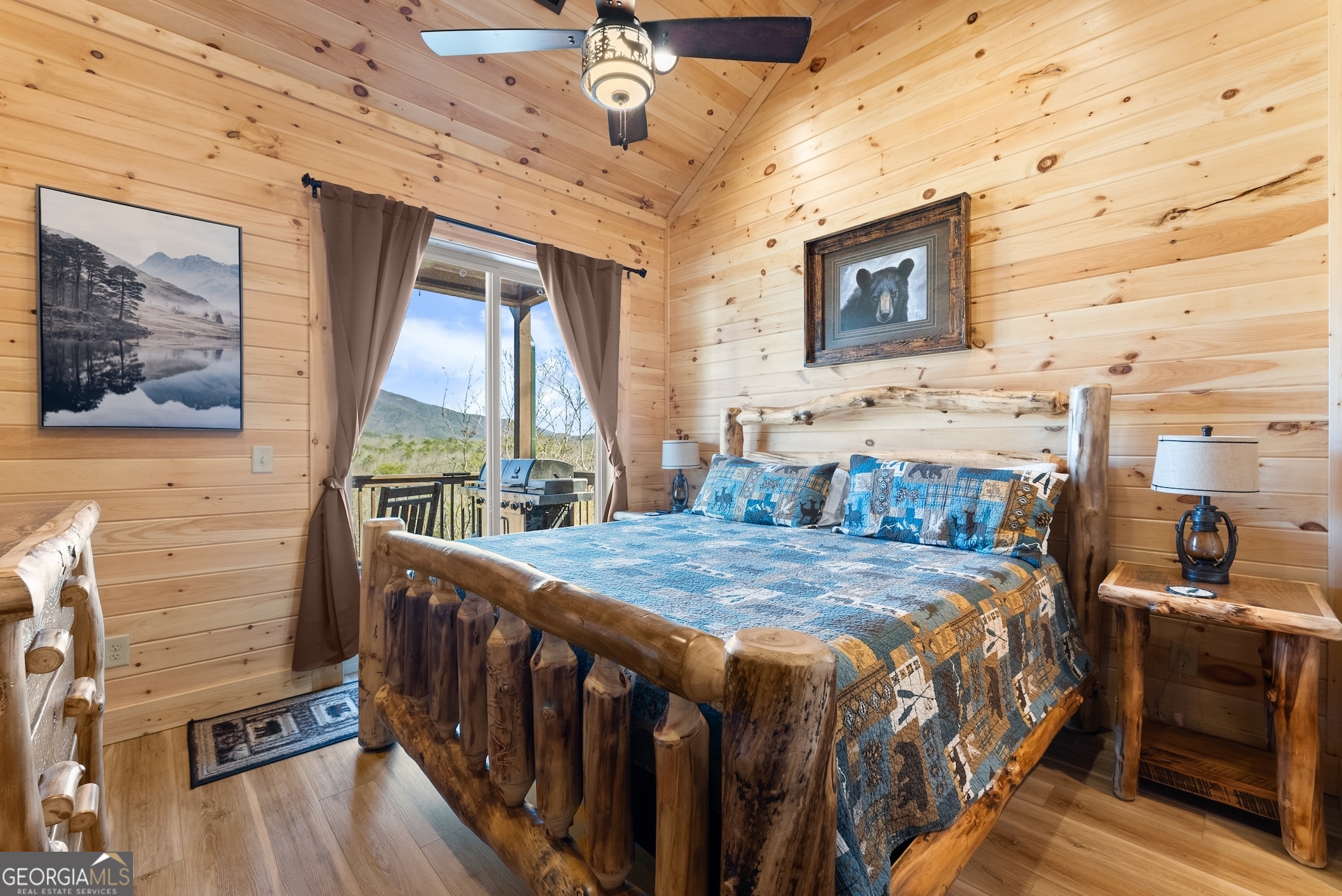 473 Monroe Ridge Road Sautee Nacoochee, GA 30571 - Photo 11 of 63 a bedroom with a bed next to a window