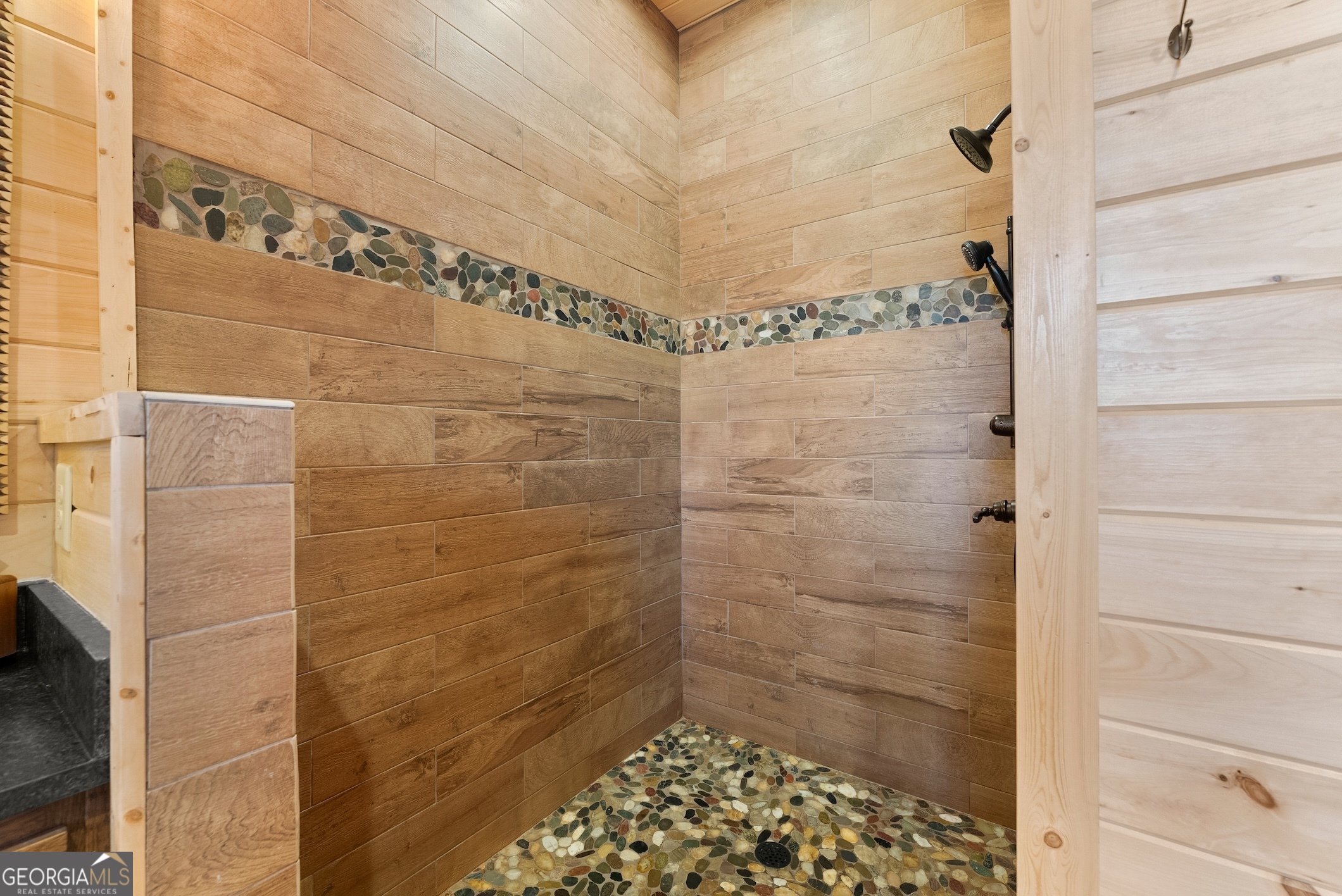 473 Monroe Ridge Road Sautee Nacoochee, GA 30571 - Photo 16 of 63 a bathroom with a shower