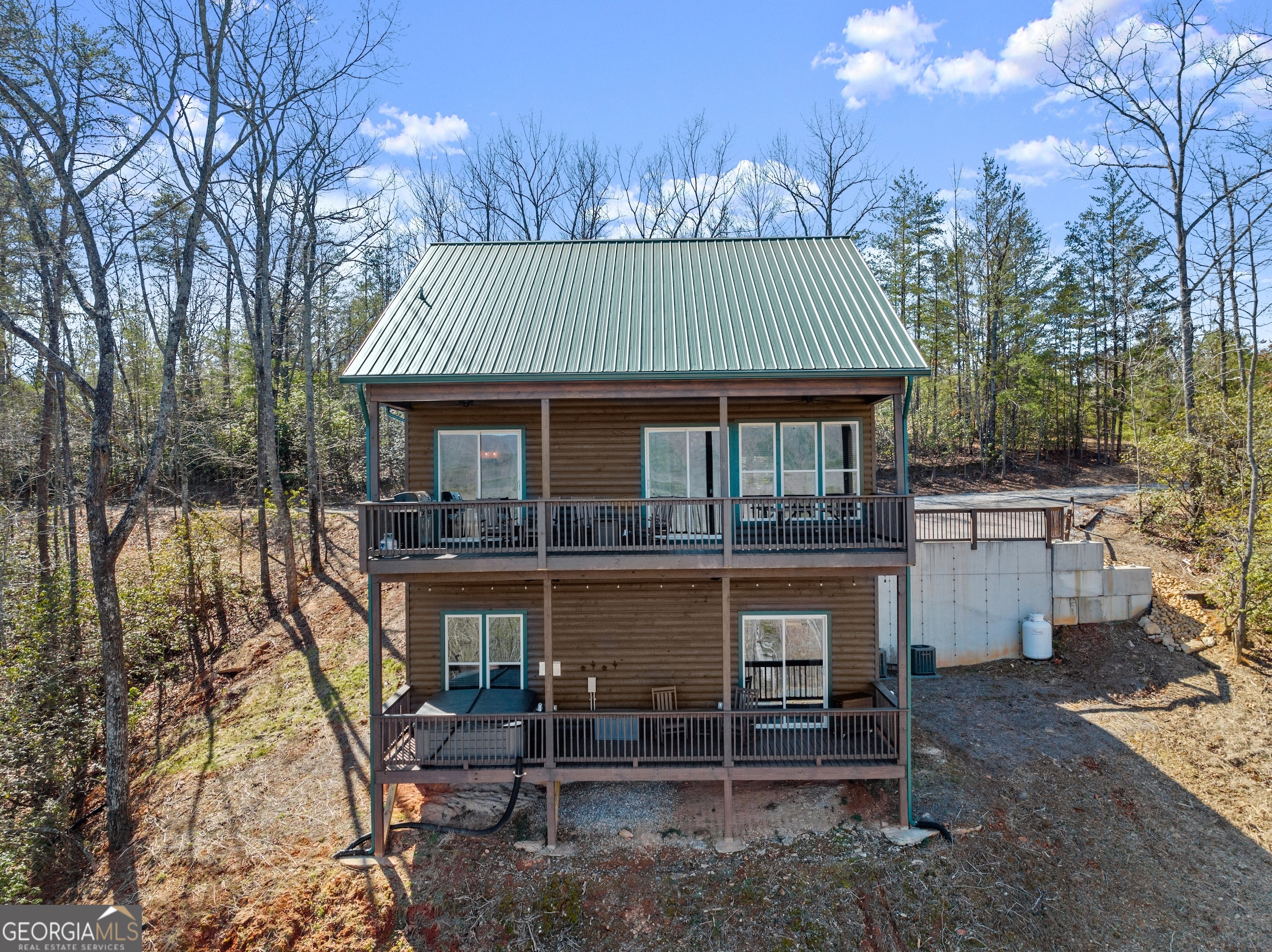 473 Monroe Ridge Road Sautee Nacoochee, GA 30571 - Photo 39 of 63 a front view of a house with a yard