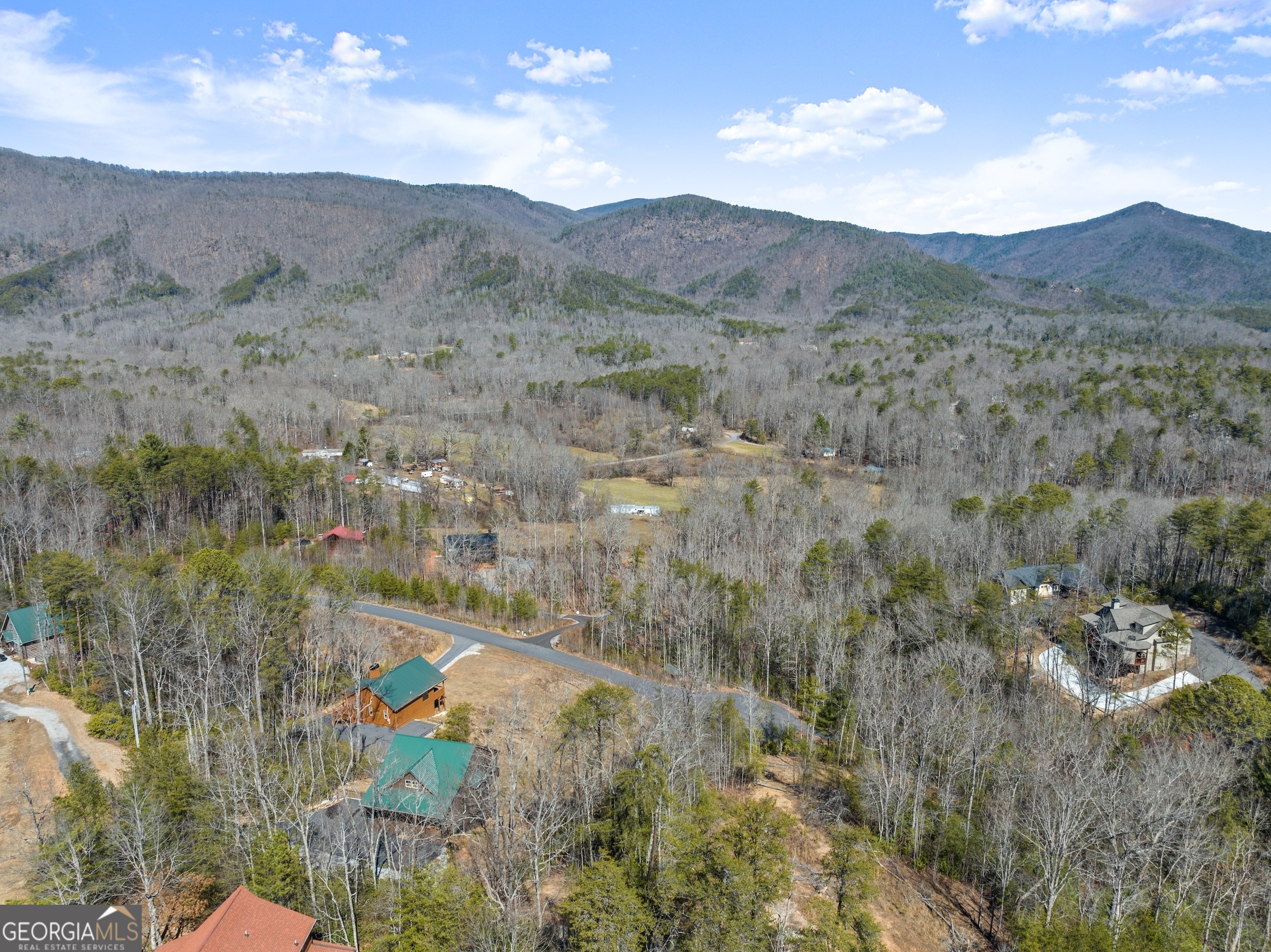 473 Monroe Ridge Road Sautee Nacoochee, GA 30571 - Photo 42 of 63 a view of a lot of trees and mountains