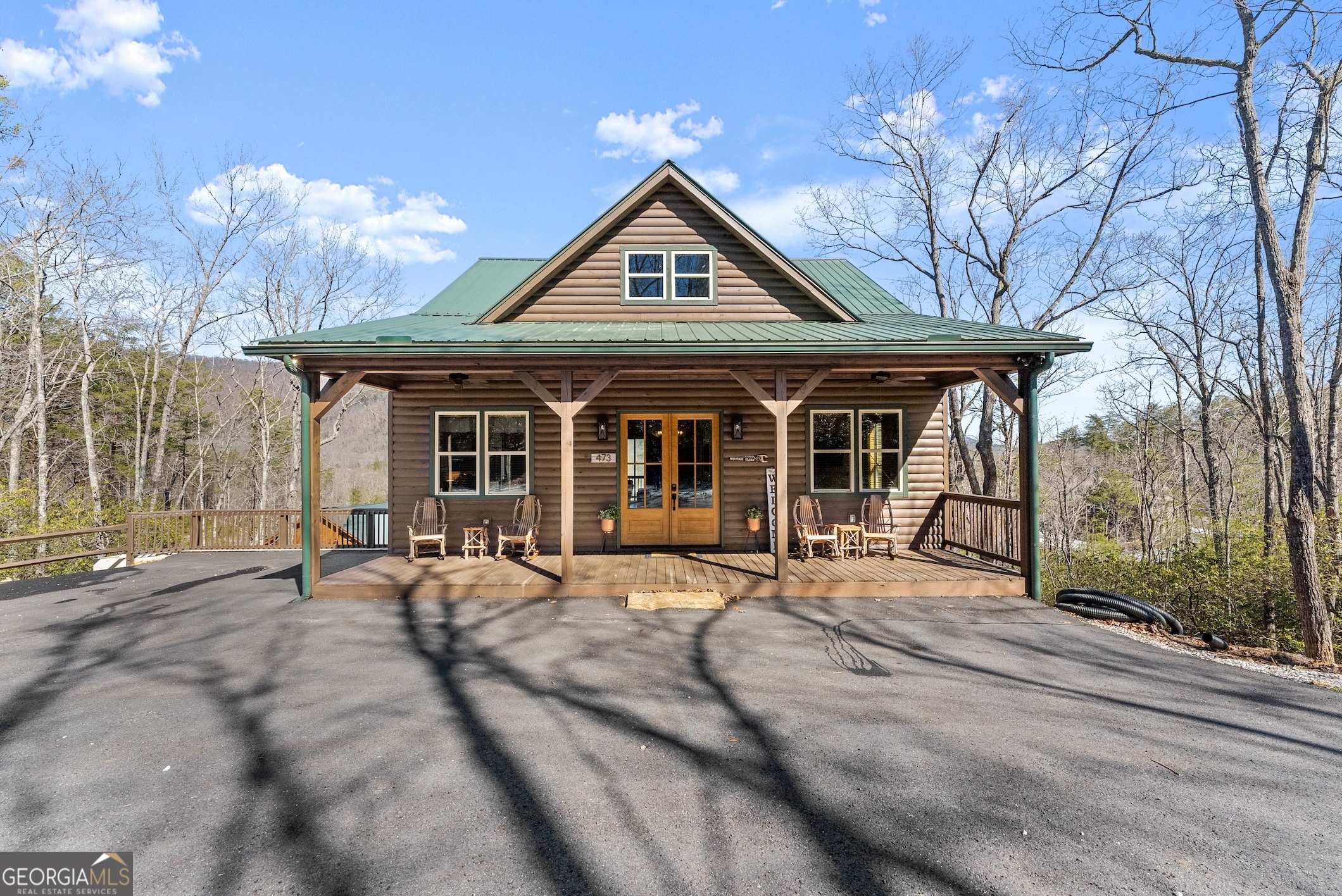 473 Monroe Ridge Road Sautee Nacoochee, GA 30571 - Photo 47 of 63 a front view of a house with garden and trees