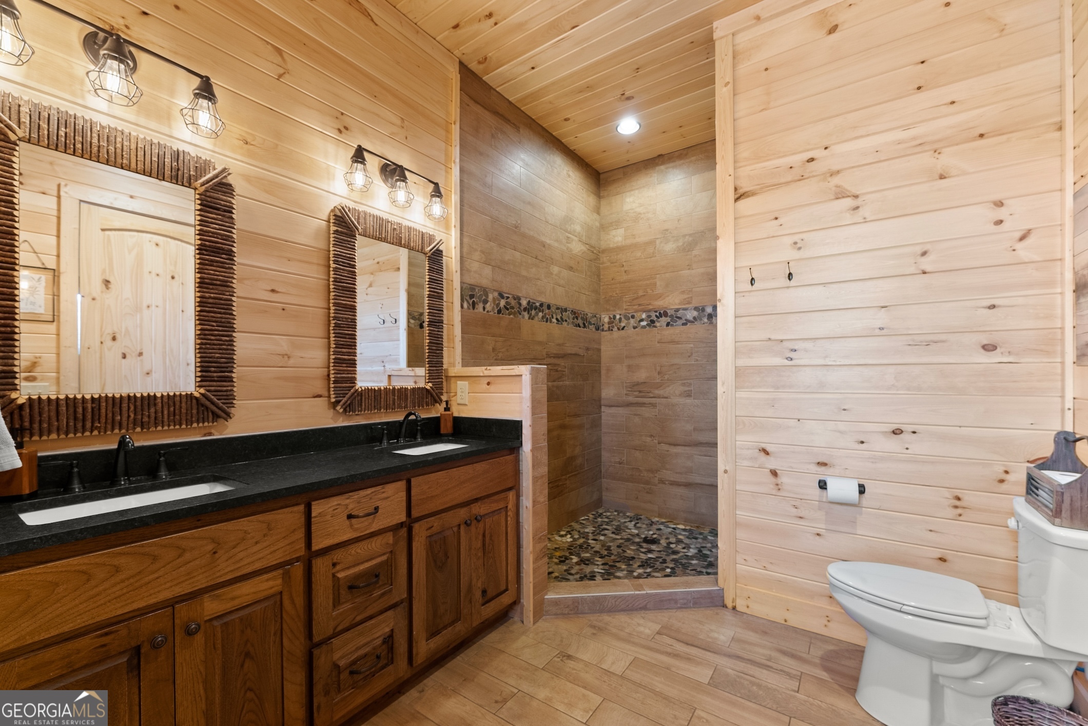 473 Monroe Ridge Road Sautee Nacoochee, GA 30571 - Photo 50 of 63 a bathroom with a granite countertop sink toilet and shower