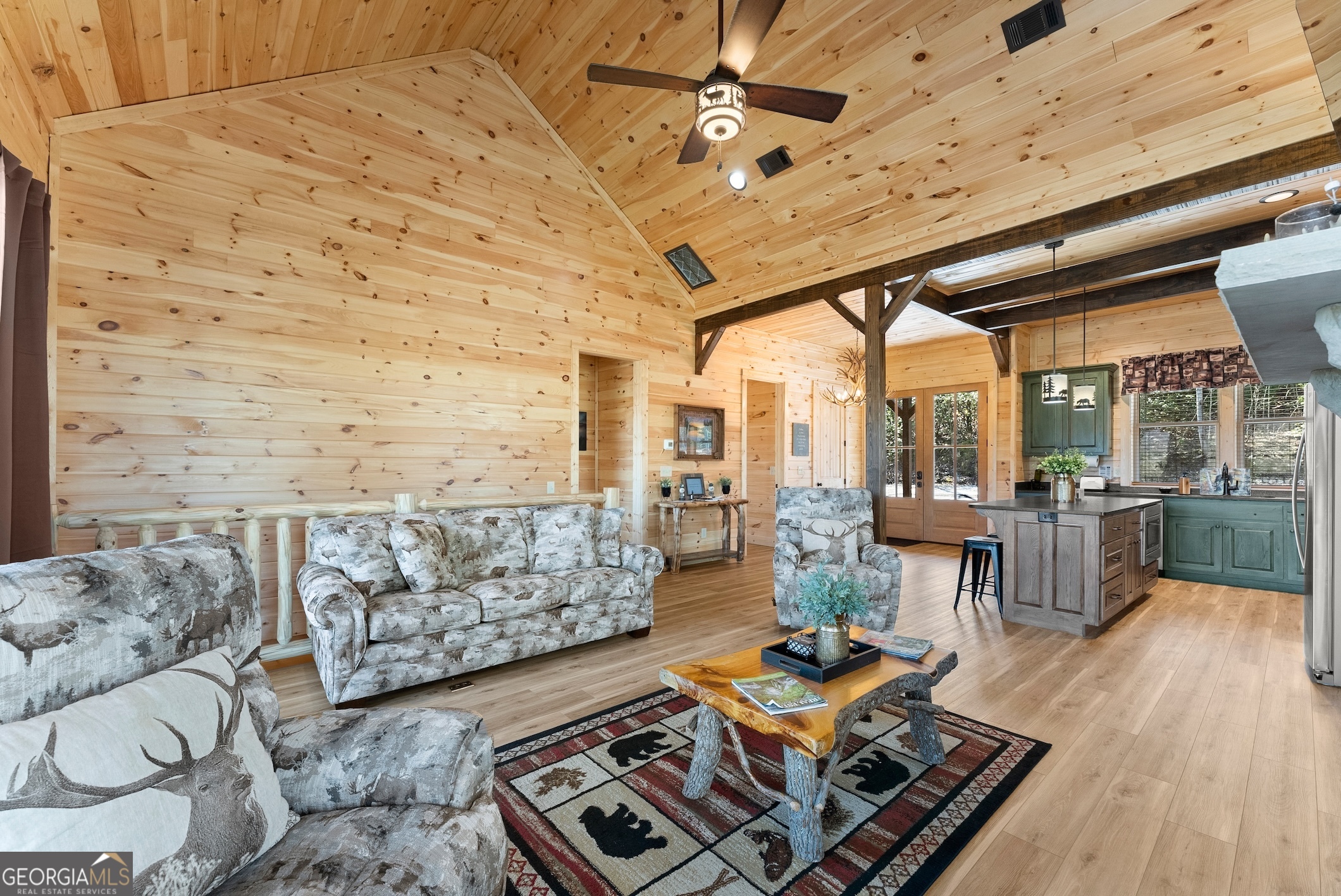 473 Monroe Ridge Road Sautee Nacoochee, GA 30571 - Photo 52 of 63 a living room with furniture and wooden floor