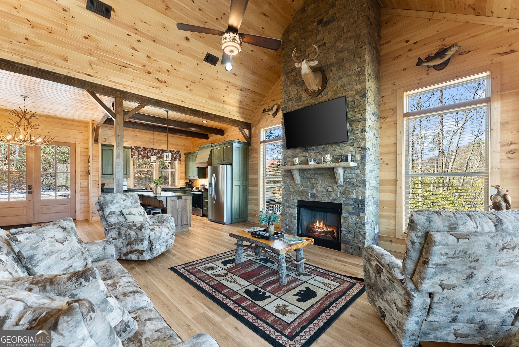 473 Monroe Ridge Road Sautee Nacoochee, GA 30571 - Photo 53 of 63 a living room with furniture fireplace and flat screen tv