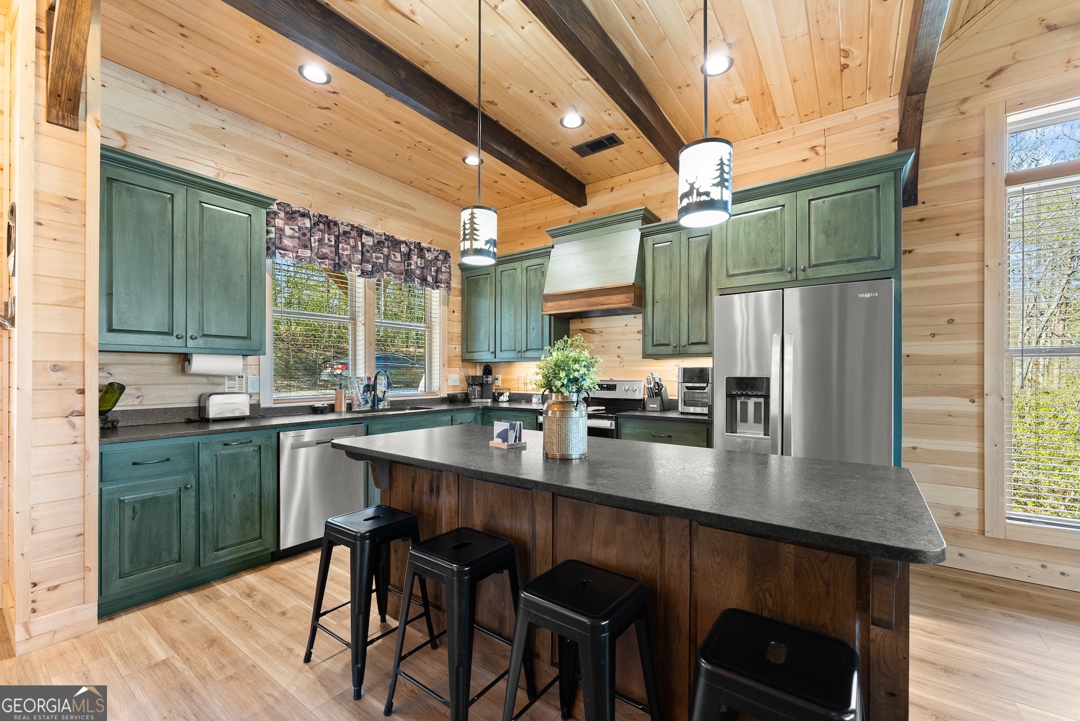 473 Monroe Ridge Road Sautee Nacoochee, GA 30571 - Photo 55 of 63 a kitchen with stainless steel appliances granite countertop a sink a stove and refrigerator