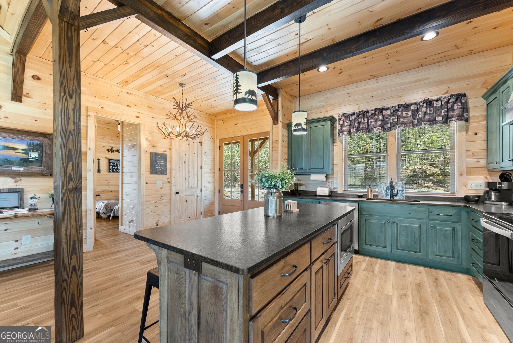 473 Monroe Ridge Road Sautee Nacoochee, GA 30571 - Photo 7 of 63 a kitchen with stainless steel appliances granite countertop sink stove and refrigerator