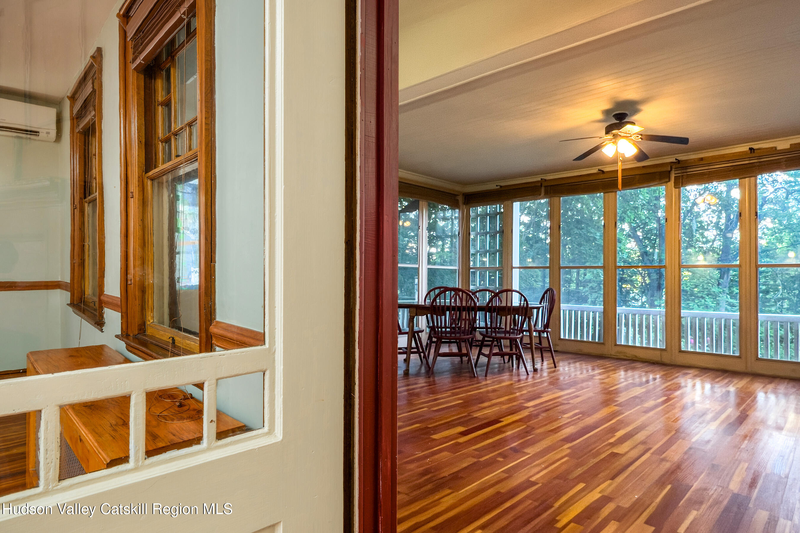 6 Westridge Road Cooperstown, NY 13326 - Photo 48 of 119 a view of a dining room with furniture window and wooden floor