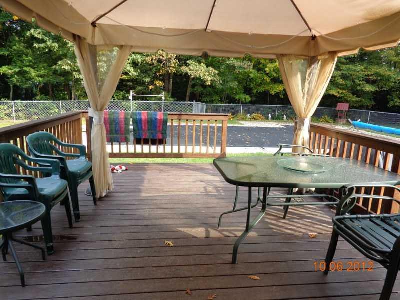 13 Timberhill Road Windham, ME 04062 - Photo 2 of 17 Patio/Deck. Relax by the pool