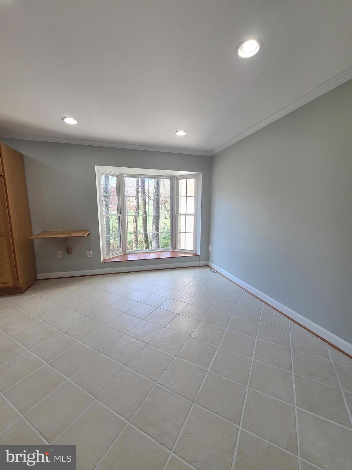 6644 Green Ash Drive Springfield, VA 22152 - Photo 11 of 42 a view of an empty room with a window
