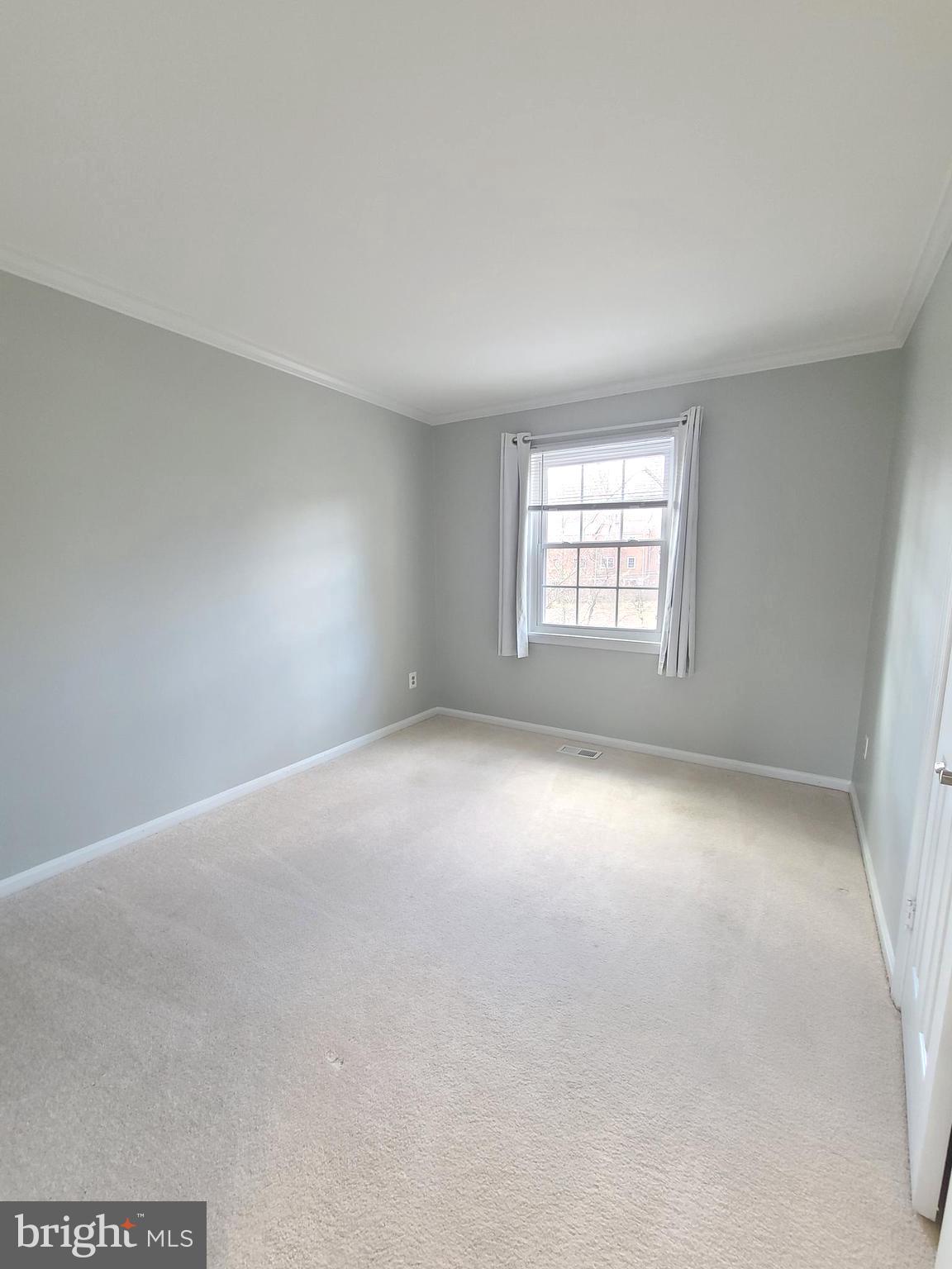6644 Green Ash Drive Springfield, VA 22152 - Photo 27 of 42 an empty room with windows