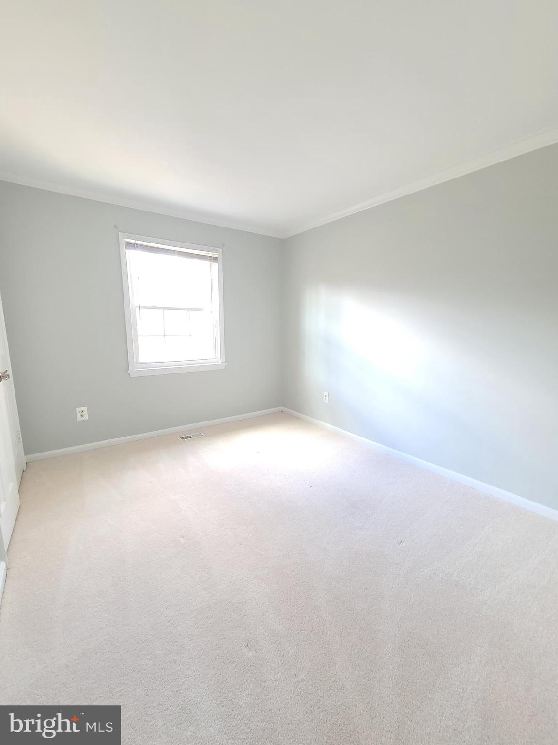 6644 Green Ash Drive Springfield, VA 22152 - Photo 31 of 42 an empty room with a window