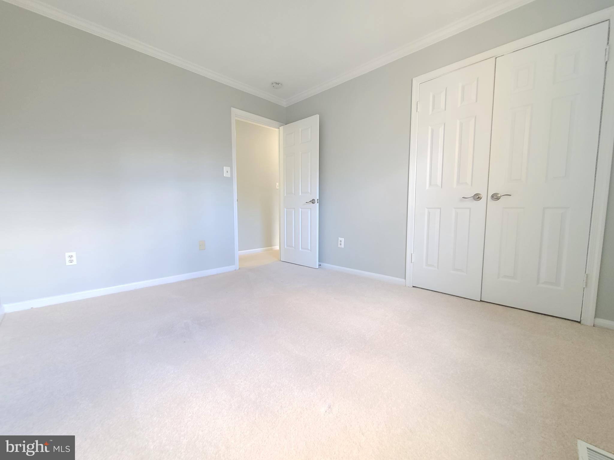 6644 Green Ash Drive Springfield, VA 22152 - Photo 32 of 42 a view of an empty room and closet area
