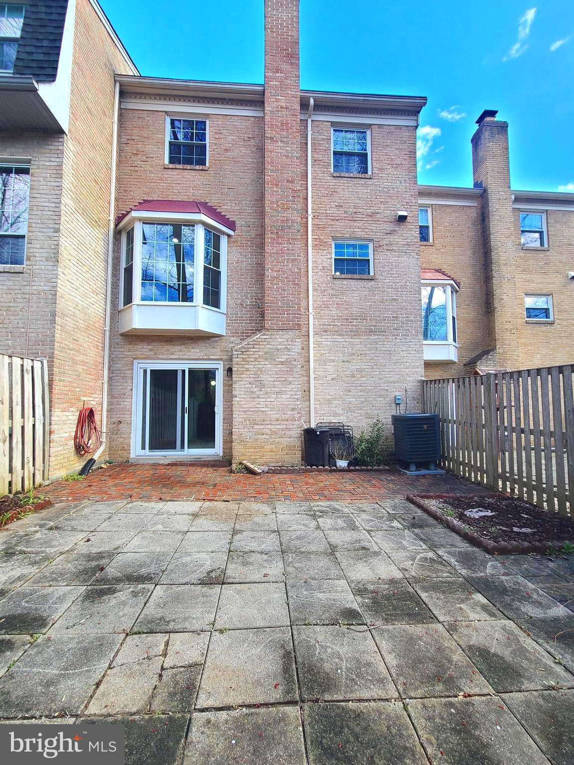6644 Green Ash Drive Springfield, VA 22152 - Photo 40 of 42 a front view of a house with a yard