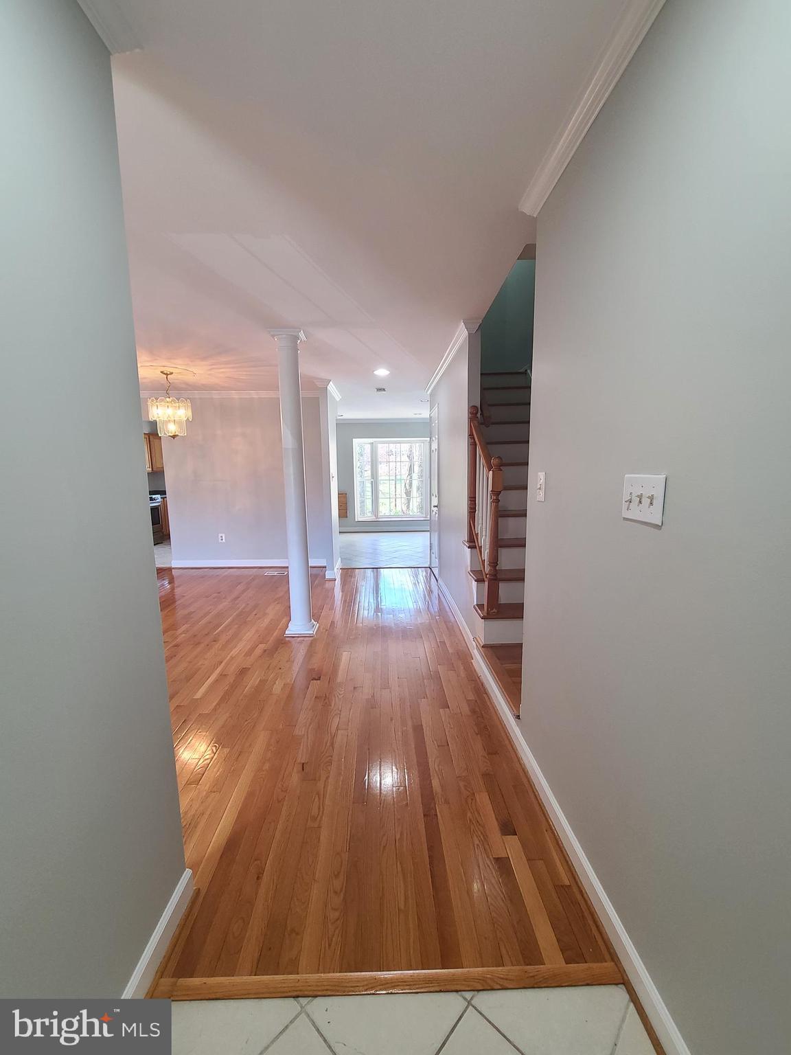6644 Green Ash Drive Springfield, VA 22152 - Photo 4 of 42 a view of entryway with wooden floor