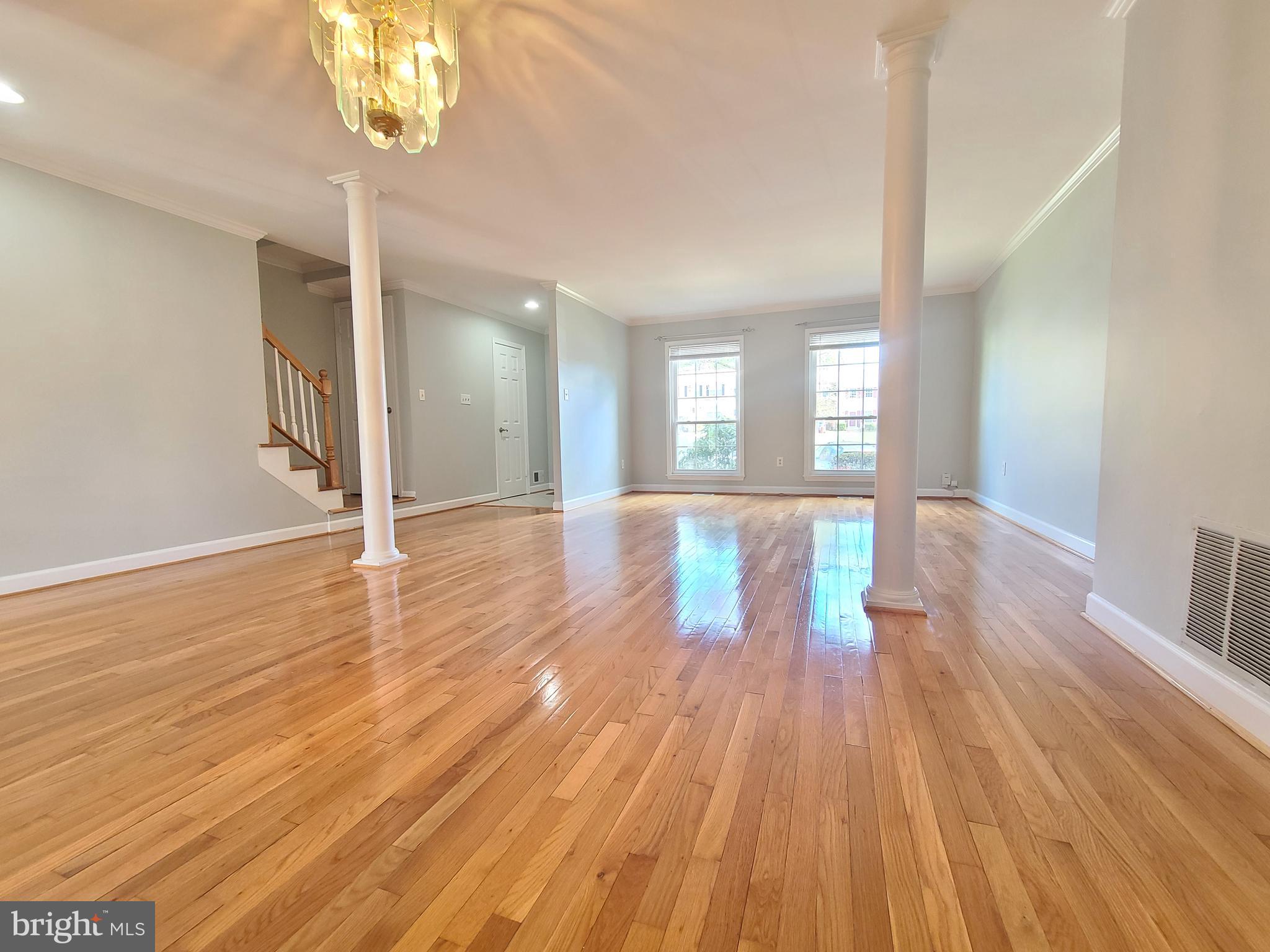 6644 Green Ash Drive Springfield, VA 22152 - Photo 10 of 42 wooden floor in an empty room with a window