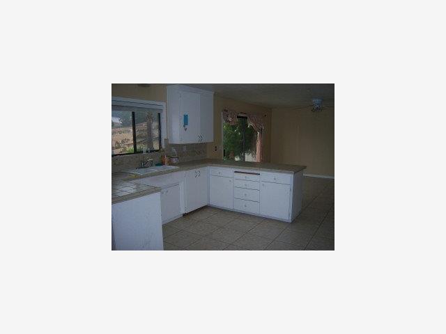38 Miller Road Watsonville, CA 95076 - Photo 5 of 9 a upper view of a kitchen with a sink and a large window
