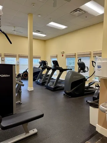 a gym room with gym equipment