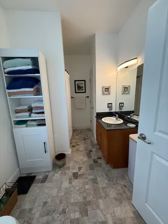 a room with a sink and a toilet