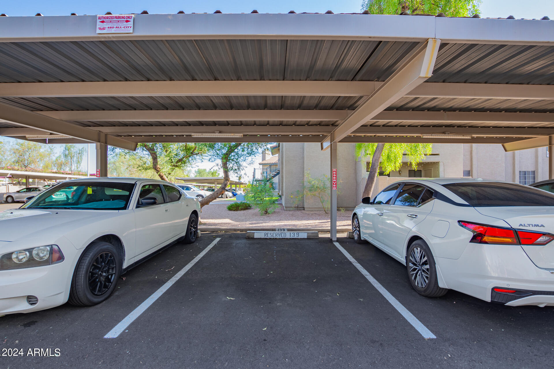 533 West Guadalupe Road, Unit 2046 Mesa, AZ 85210 - Photo 28 of 29 a car parked in a garage