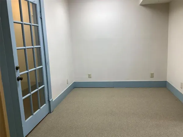 a view of a room with rack on the wall