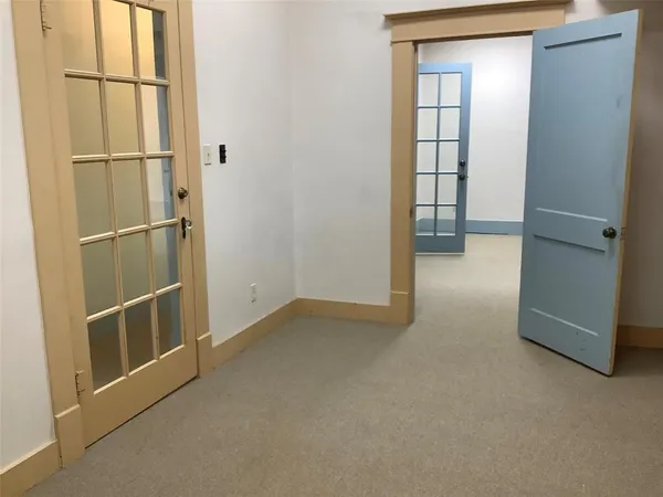 an empty room with windows
