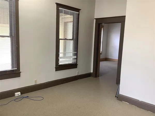 an empty room with windows