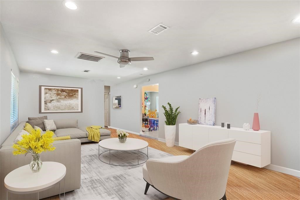 5302 Treaschwig Road Spring, TX 77373 - Photo 11 of 41 a living room with furniture and a wooden floor