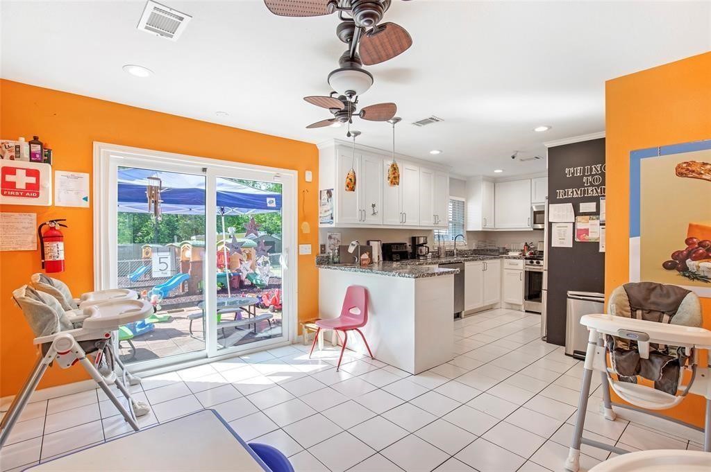 5302 Treaschwig Road Spring, TX 77373 - Photo 12 of 41 a kitchen view with table chairs appliances and cabinets