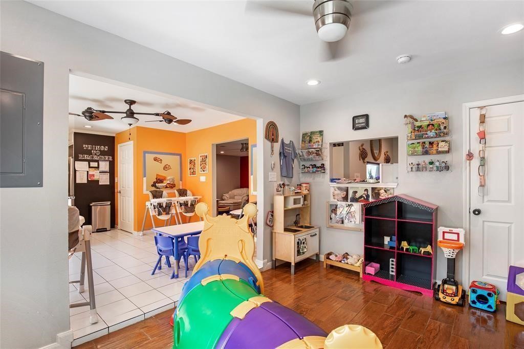 5302 Treaschwig Road Spring, TX 77373 - Photo 22 of 41 a living room with furniture and a wooden floor