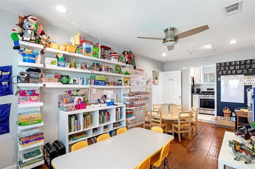 5302 Treaschwig Road Spring, TX 77373 - Photo 28 of 41 a room with furniture toys and a book shelf