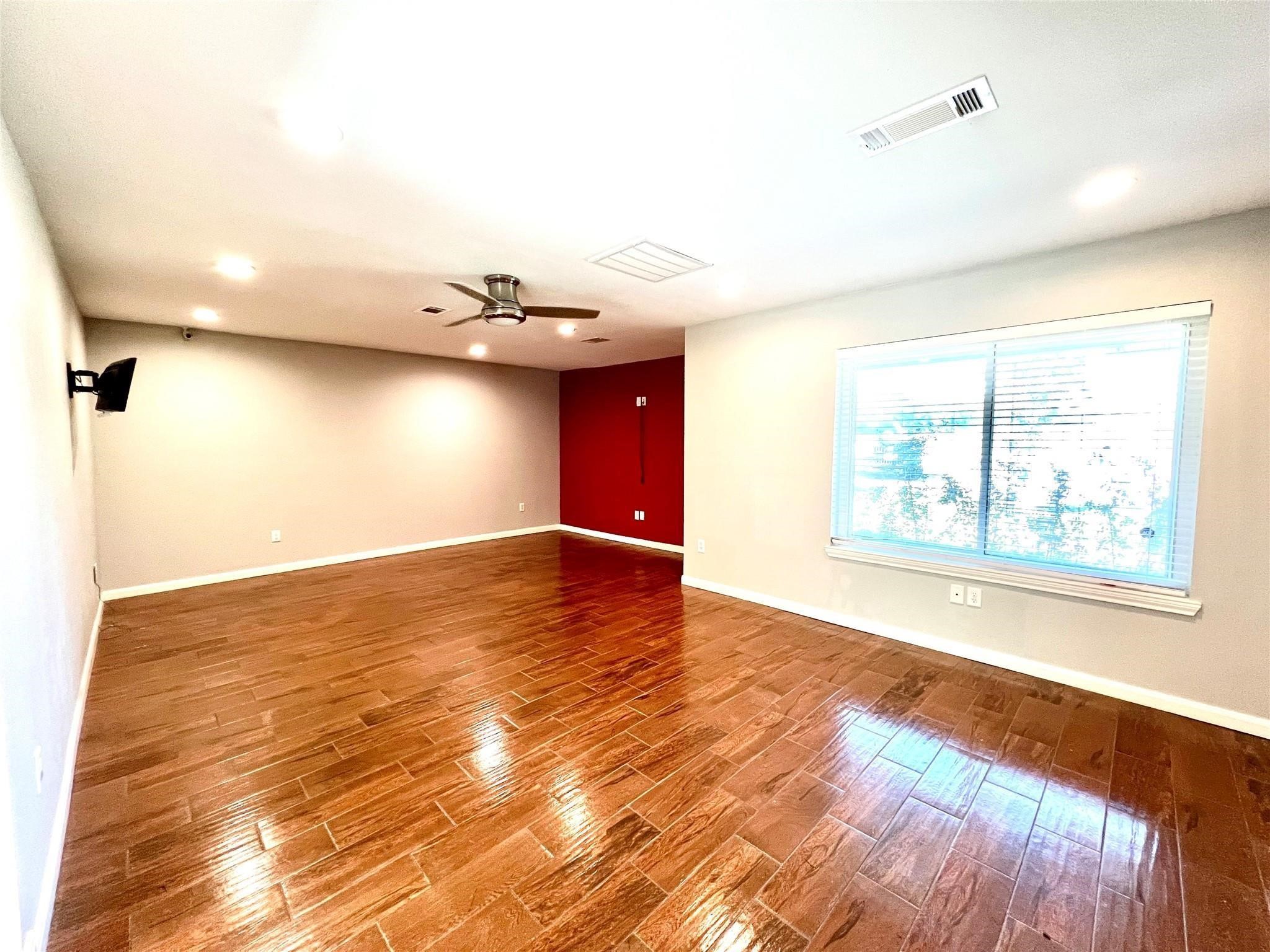5302 Treaschwig Road Spring, TX 77373 - Photo 35 of 41 a view of an empty room and window