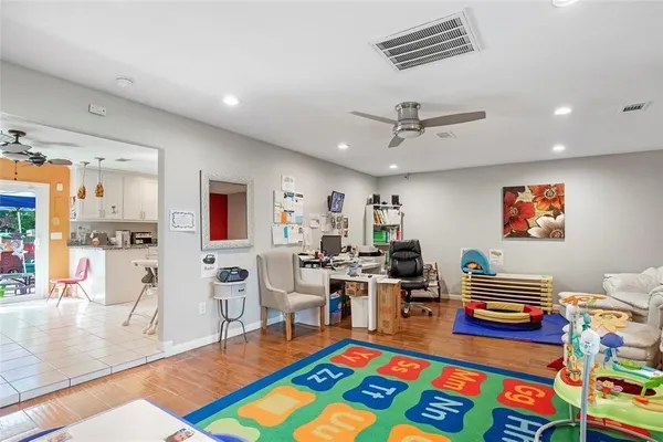 a living room with patio and a table