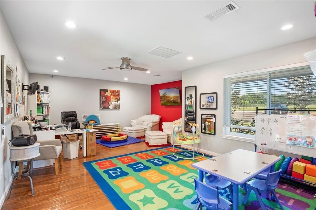 5302 Treaschwig Road Spring, TX 77373 - Photo 6 of 41 a living room with patio furniture and a table