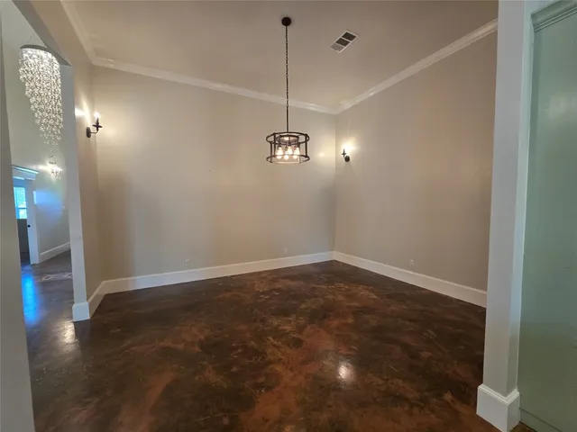 a view of a room with window and hardwood floor