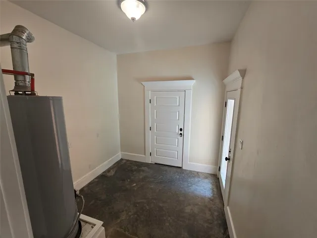 an empty room with a door