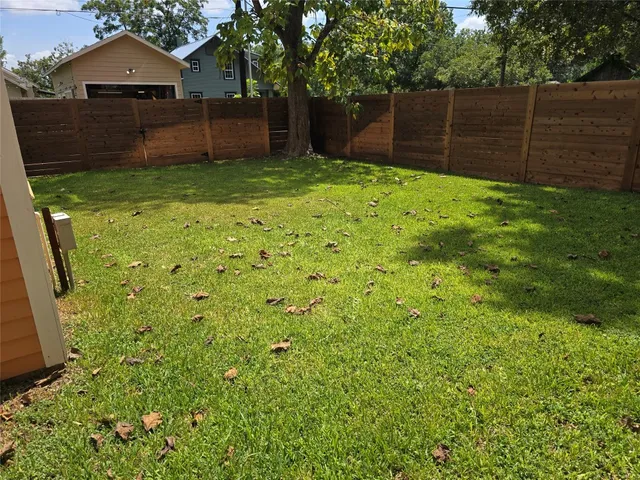 a view of a backyard with a garden