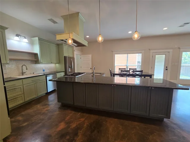 a bathroom with a sink vanity and a mirror