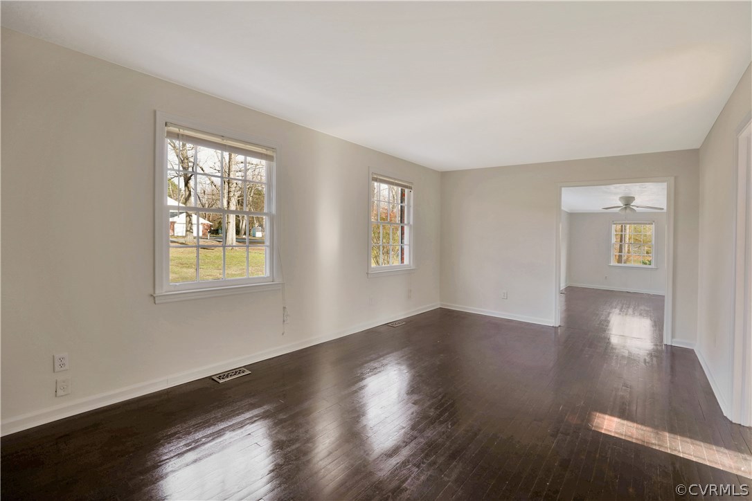 4601 Treely Road Chester, VA 23831 - Photo 5 of 27 a view of an empty room with wooden floor and a window